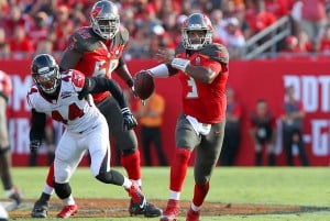 Bucs RT Demar Dotson & QB Jameis Winston - Photo by: Cliff Welch/PR