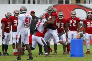 Bucs Monday Mailbag: Lb Now A Strength; Watson In Danger? 2 Bucs Te O.j. Howards And Lb Devante Bond - Photo By: Cliff Welch/Pr