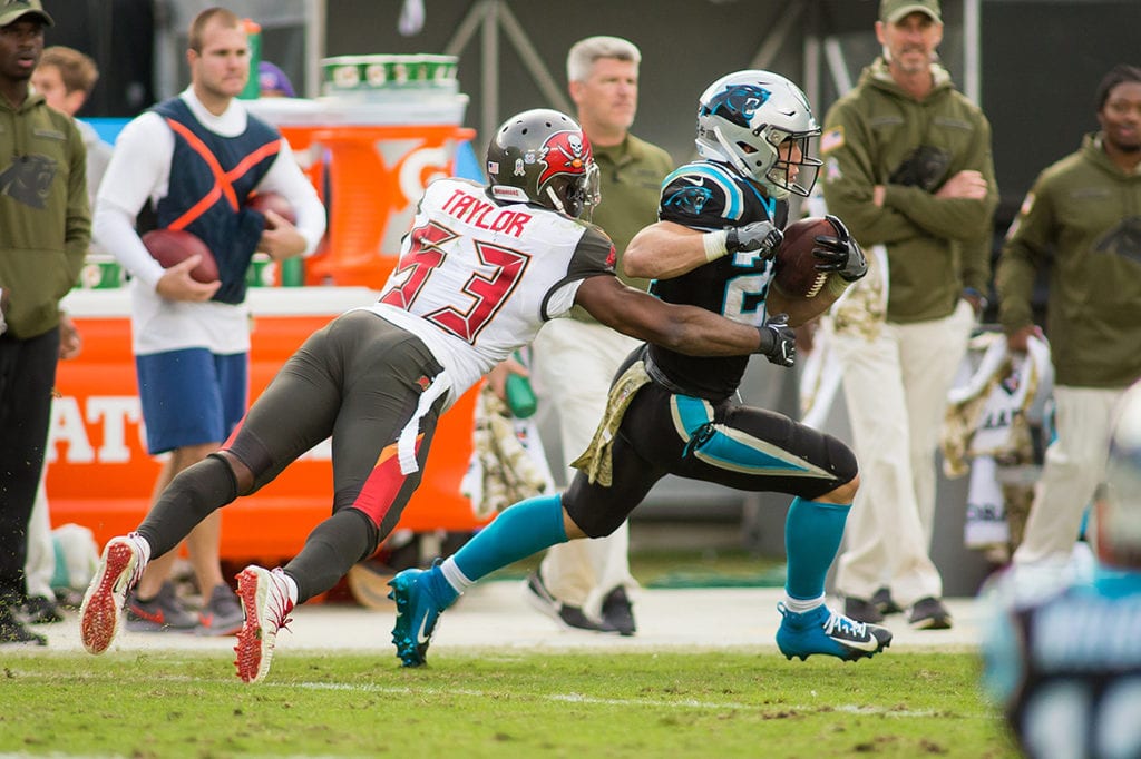 Panthers Rb Christian Mccaffrey And Bucs Lb Adarius Taylor - Photo By: Mary Holt/Pr