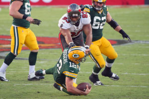 Bucs Dt Ndamukong Suh And Packers Qb Aaron Rodgers