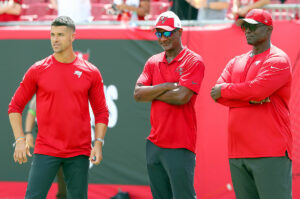 Bucks Dave Canales, Saints coordinator Keith Armstrong, Todd Bowles