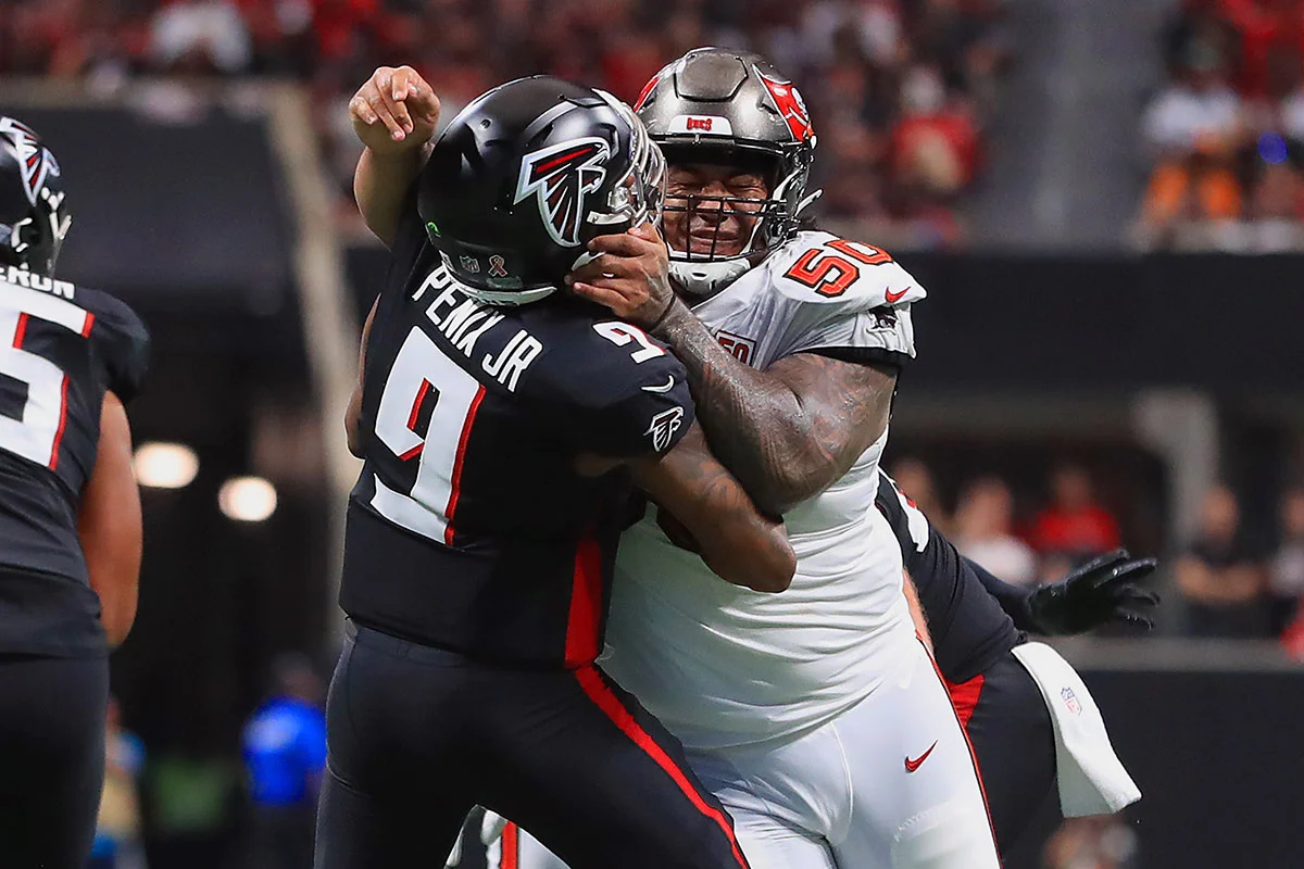 Vea-Vita-Michael-Penix-Bucs-Falcons-Hit Bucs Dt Vita Vea And Falcons Qb Michael Penix Jr.