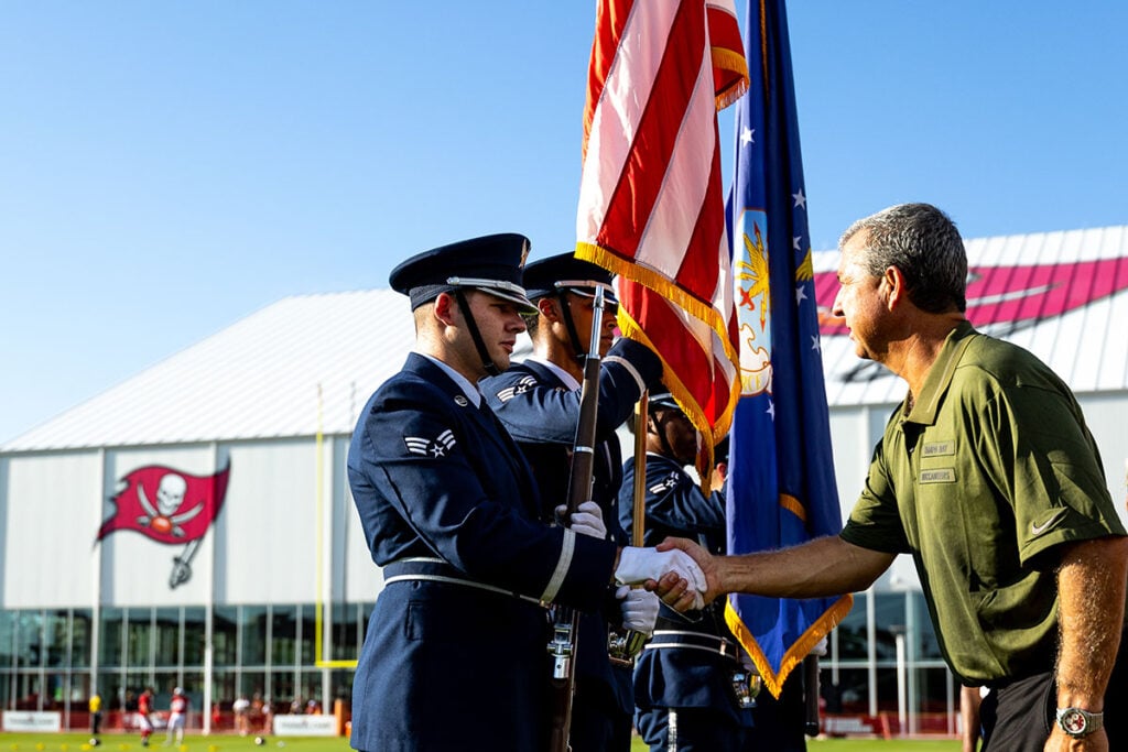 Bucs Fans Can Vote For Brian Ford To Win Salute To Service Award 3 Bucs Coo Brian Ford With Members Of The U.s. Military