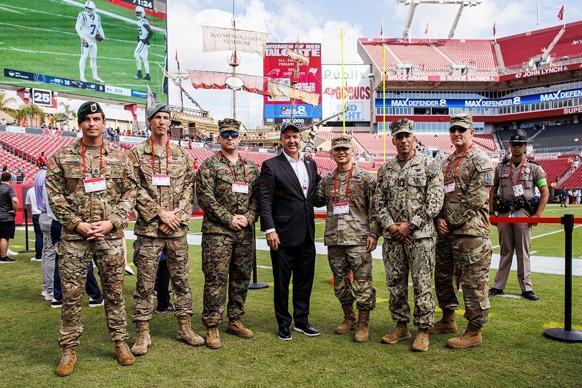 Ford-Brian-Bucs-Military-Rjs Bucs Coo Brian Ford With Members Of The U.s. Military