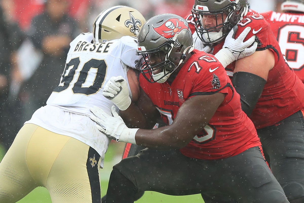 Chukwuma-Ben-Bryan-Bresee-Bucs-Saints-Block Bucs Lt Ben Chukwuma And Saints Dt Bryan Bresee
