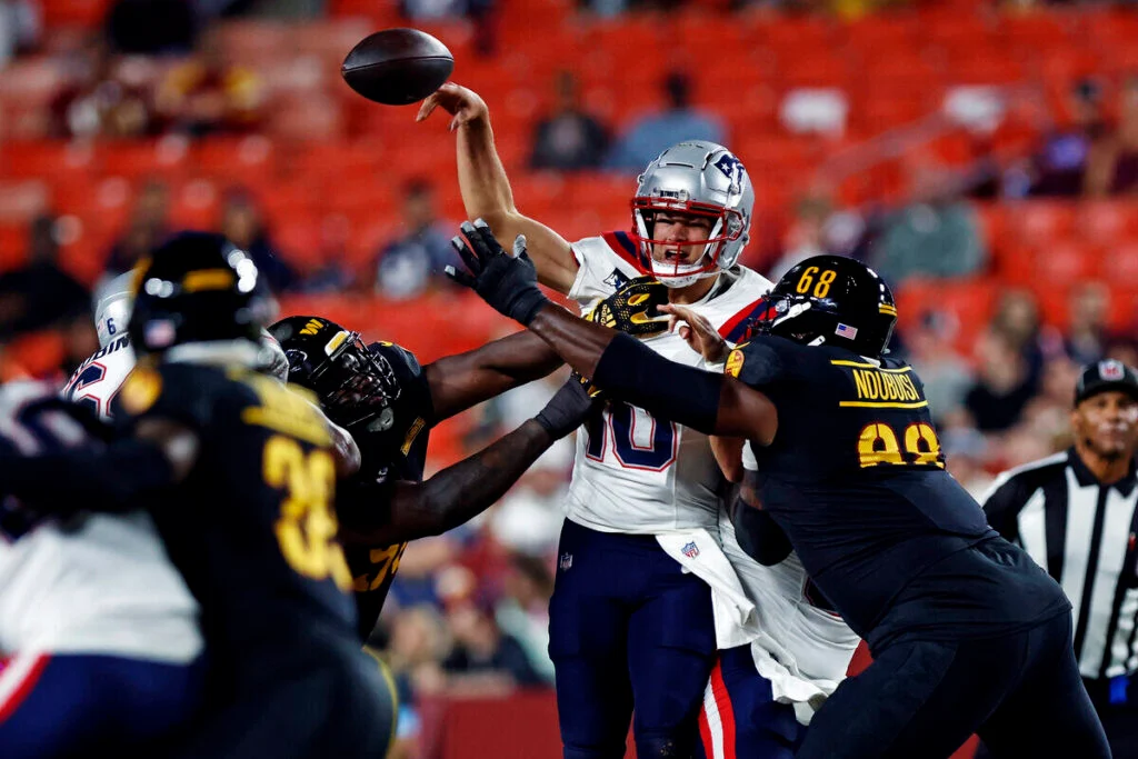 Bucs Sign Dt With Unique Football Background 3 Patriots Qb Drake Maye And Bucs Dt Haggai Ndubuisi