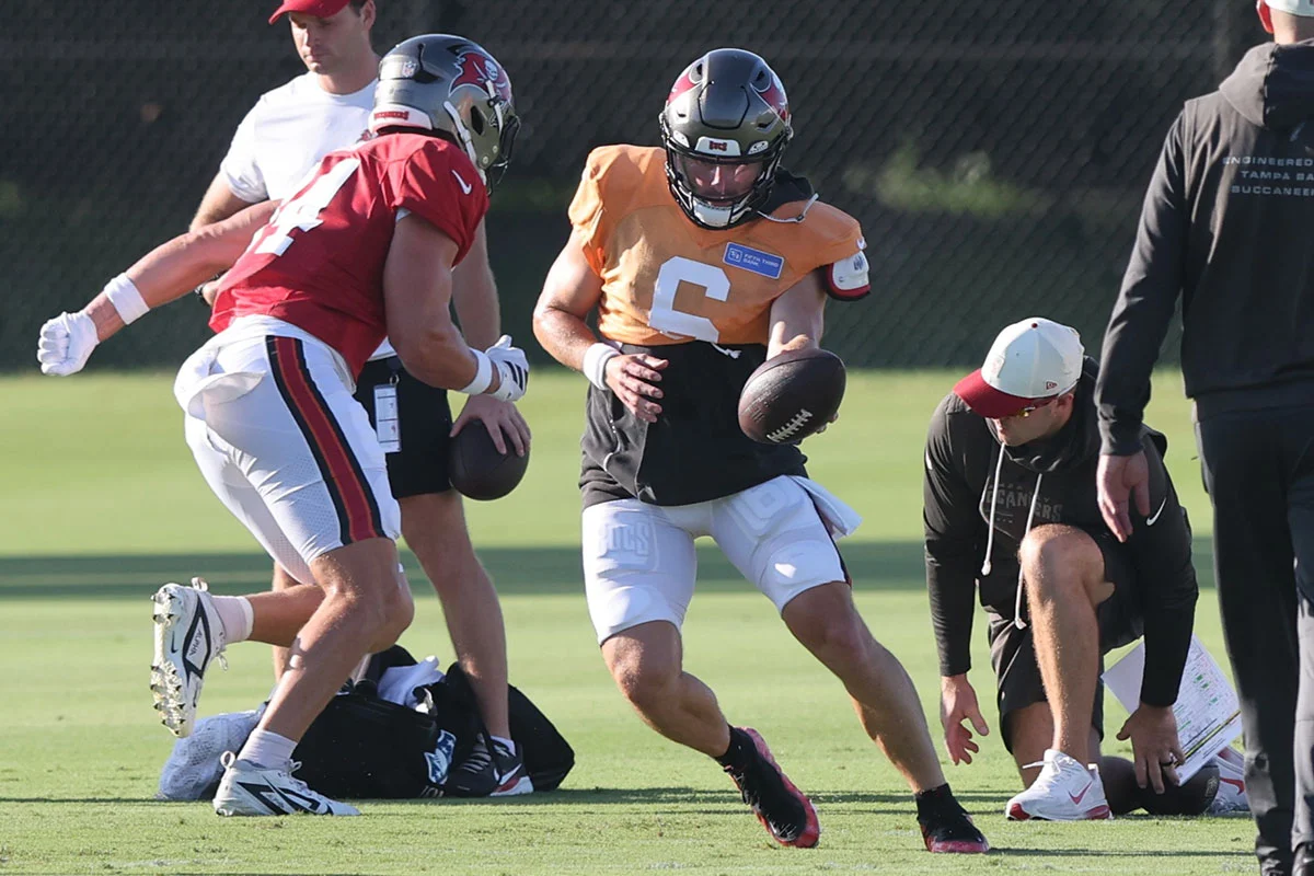Mayfield-Baker-Sean-Tucker-Bucs-Camp-Hand-Off Bucs Qb Baker Mayfield And Rb Sean Tucker