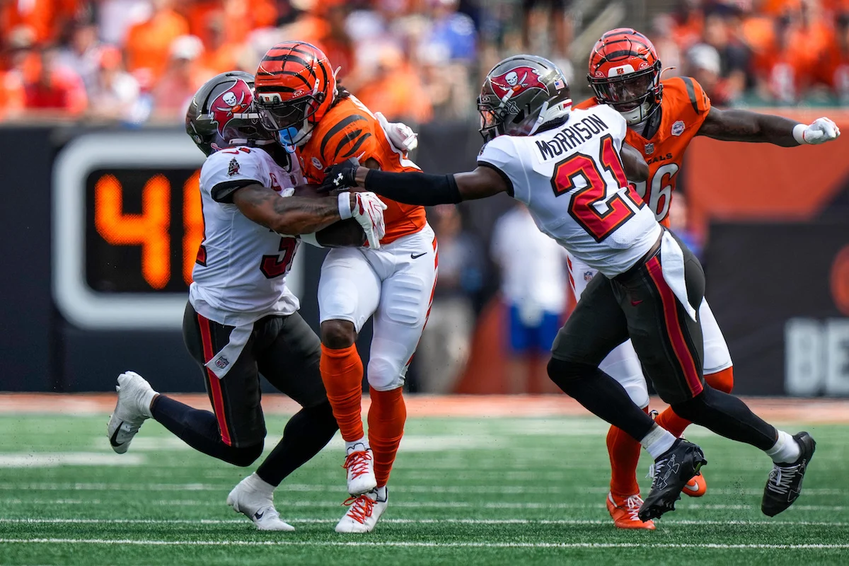 Cincinnati Bengals Wide Receiver Dohnte Meyers (81) Fights A Tackle In The Third Quarter Of The Nfl Week 1 Game Between The Bucs S Antoine Winfield Jr., Cb Benjamin Morrison - Photo By: Imagn Images Via Reuters Connect